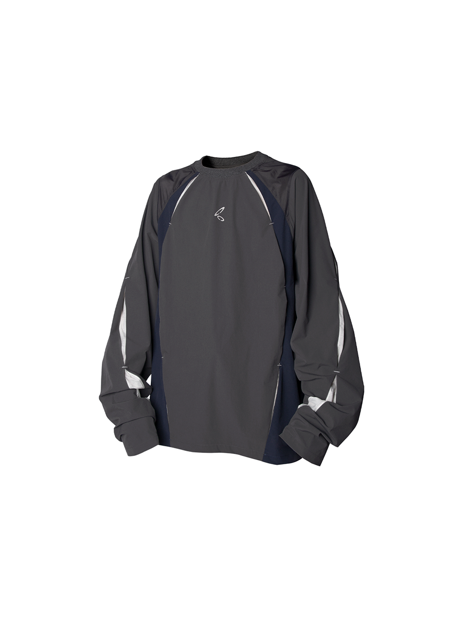 RELABEL Spatial Relationships (Gaps): Multi-material, colour-blocked patchwork design interwoven into a quick-dry outdoor T-shirt