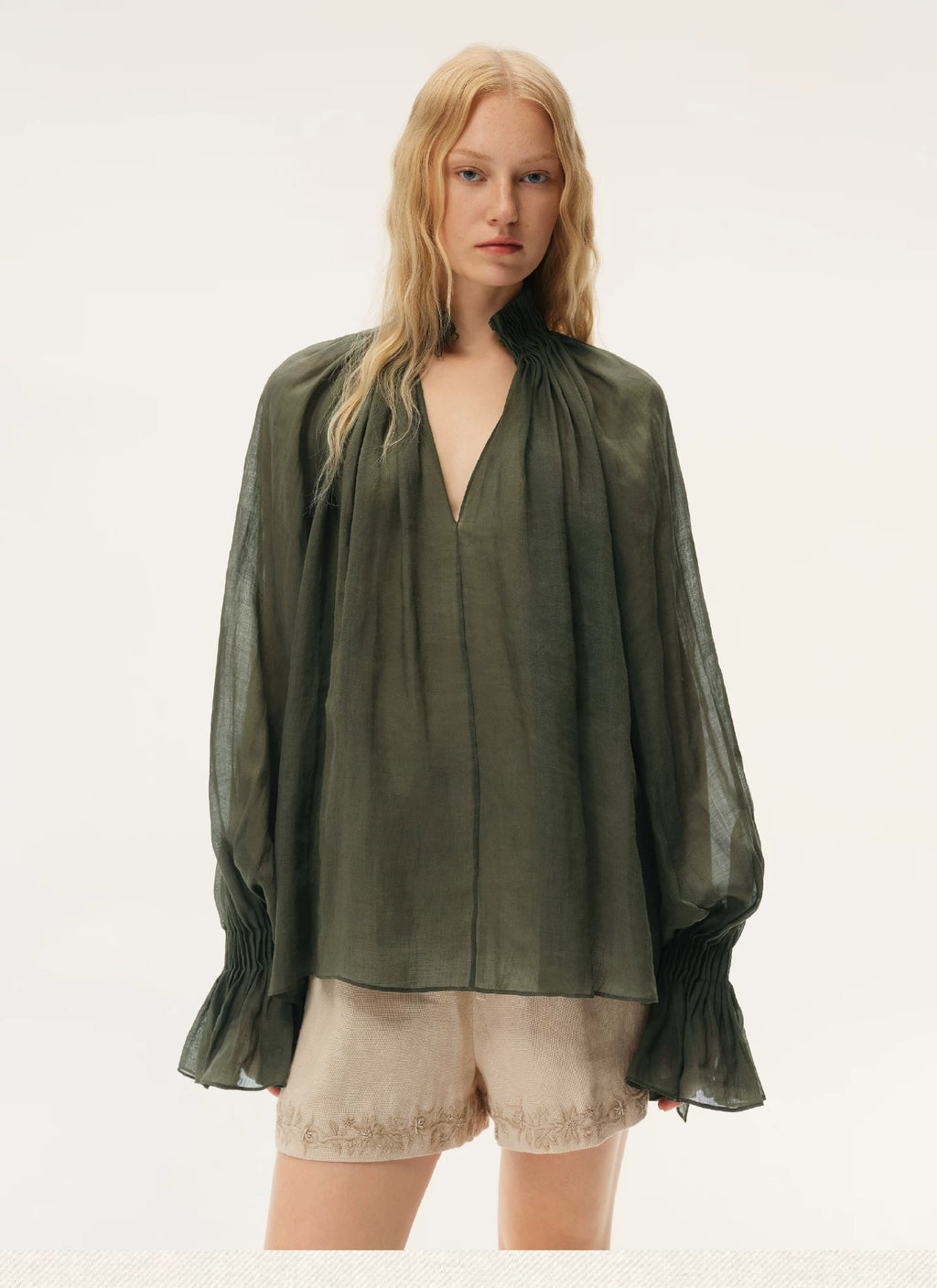 Blue Semi-Sheer Accordion Pleated Mock Neck Top