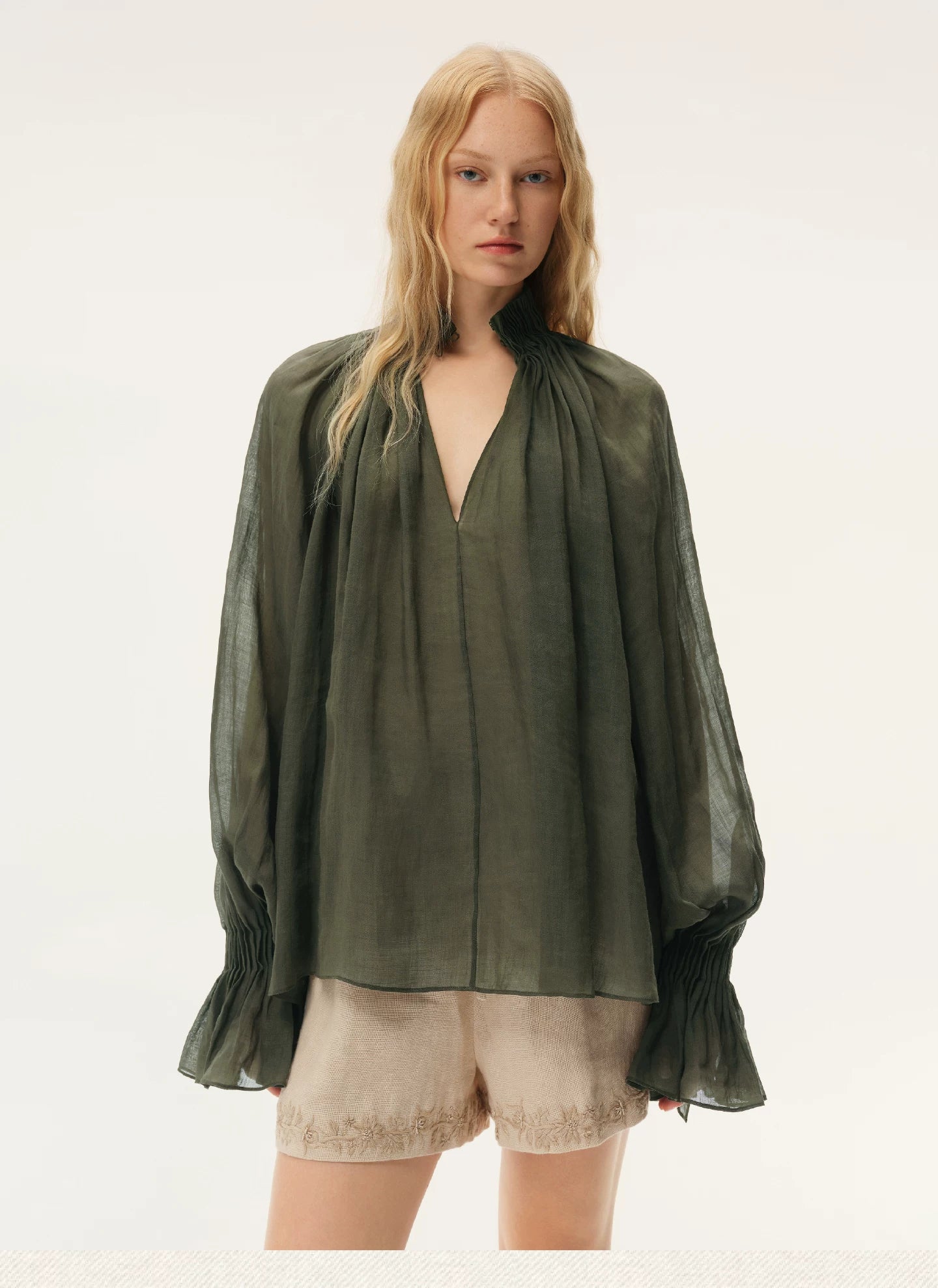 Blue Semi-Sheer Accordion Pleated Mock Neck Top