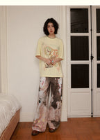 All-Over Doll Print Wide-Leg Denim Pants
