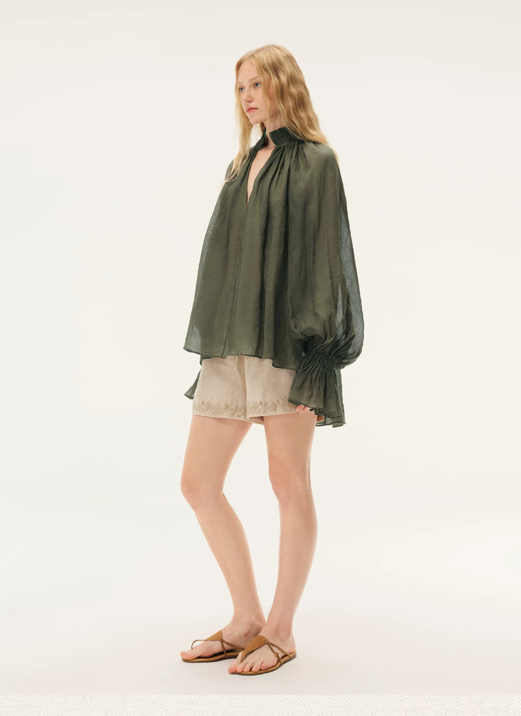 Blue Semi-Sheer Accordion Pleated Mock Neck Top